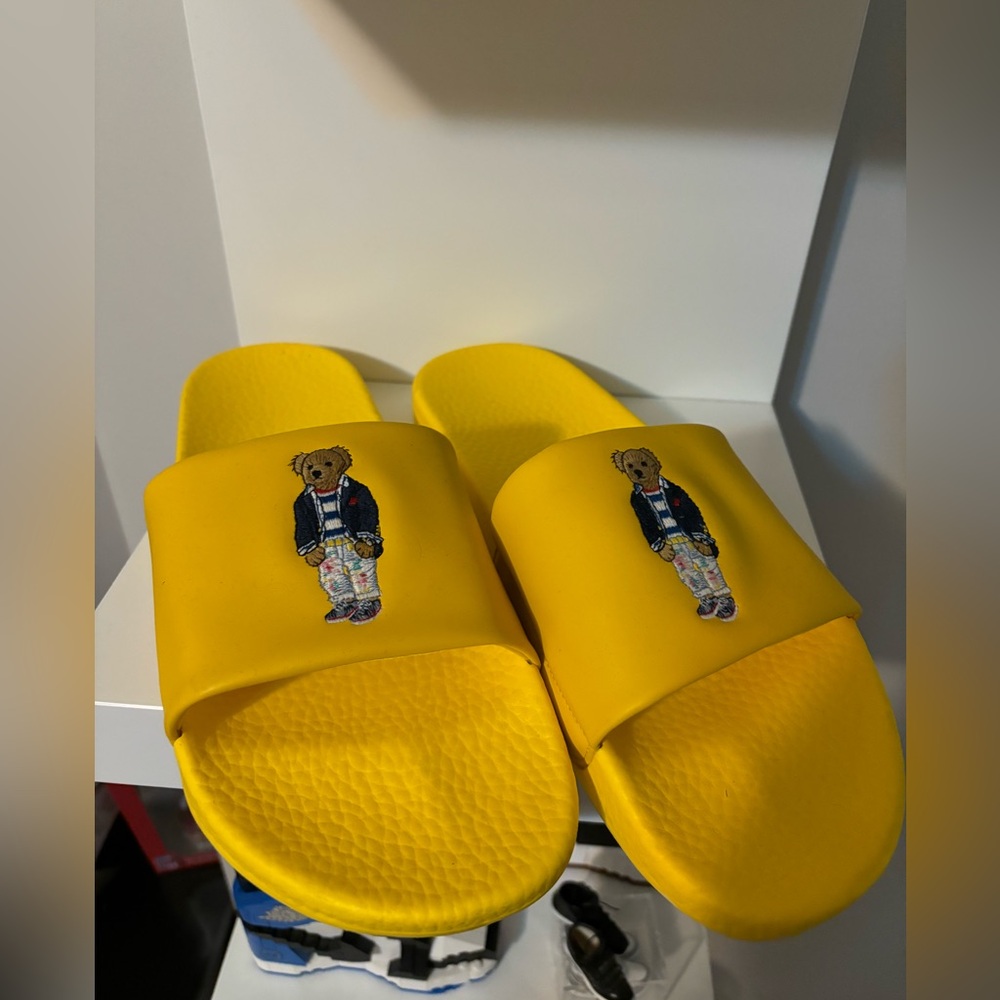 Yellow Polo Pool Slides